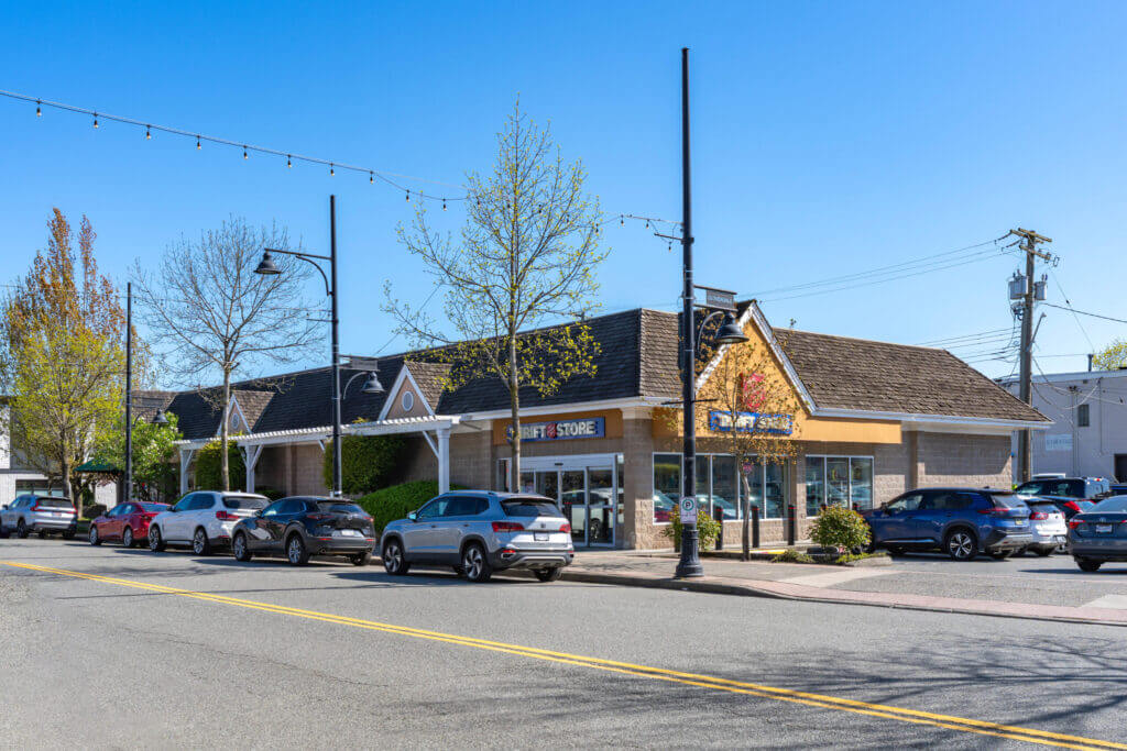 5630 176th Street full street-front view of retail plaza from Highway 10