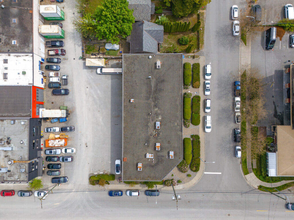 Top-down aerial view of 8771 Douglas Street roof and rear loading area