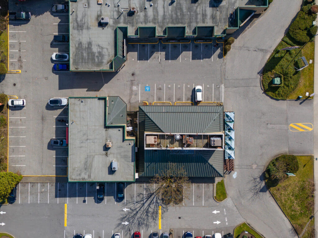 Eagle Ridge Plaza overhead view showing roof, surface parking, and site layout
