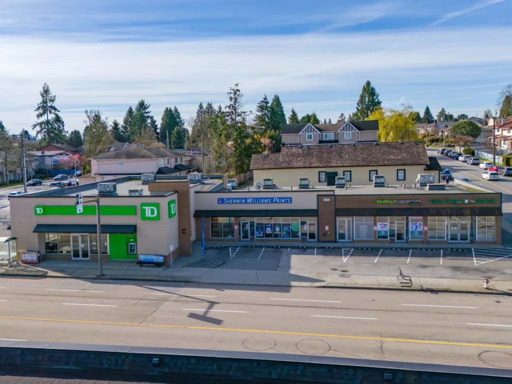 Hastings & Sperling retail strip frontage on Hastings Street showing TD Bank, Sherwin-Williams, and tenant storefronts
