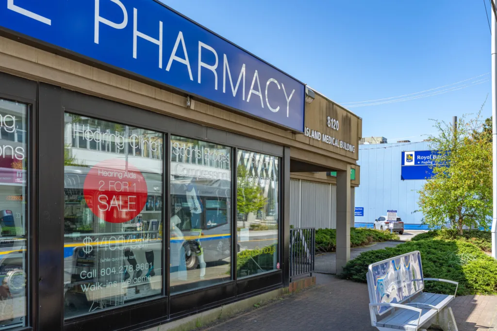 Island Medical Centre pharmacy entrance and Island Medical Building signage on Cook Road