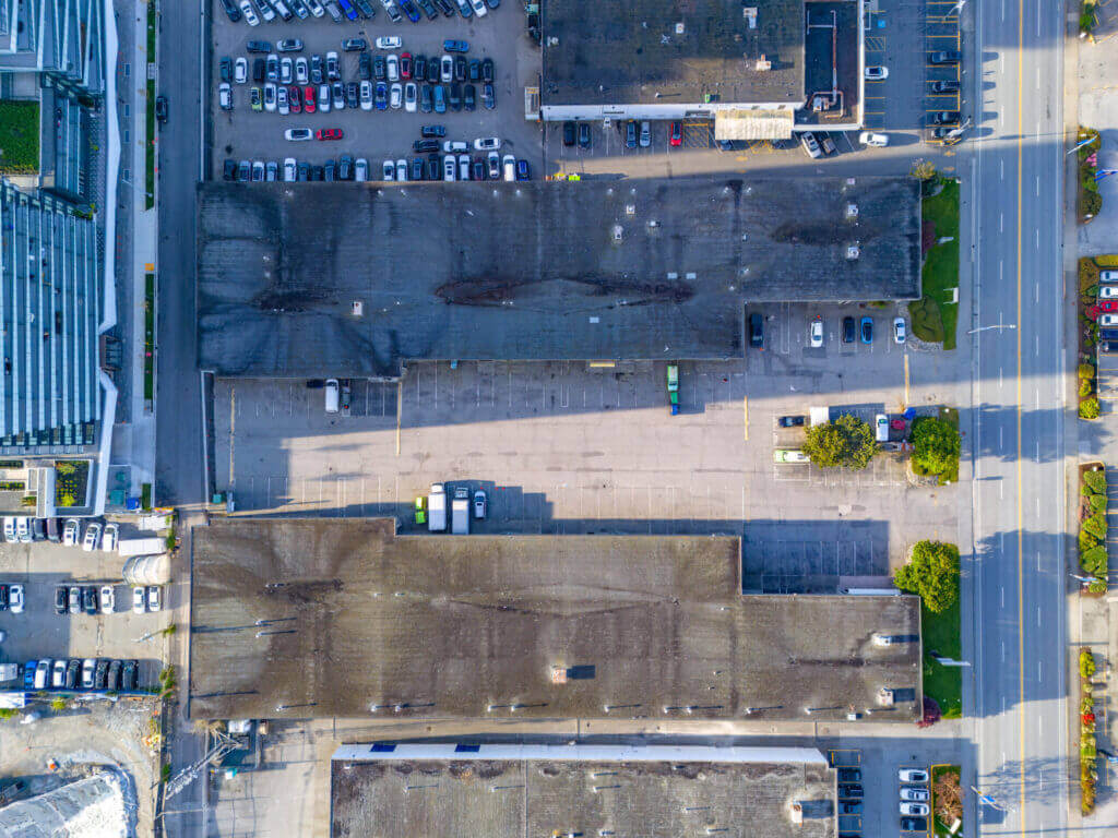 Minoru Plaza overhead view showing rooftops and parking layout