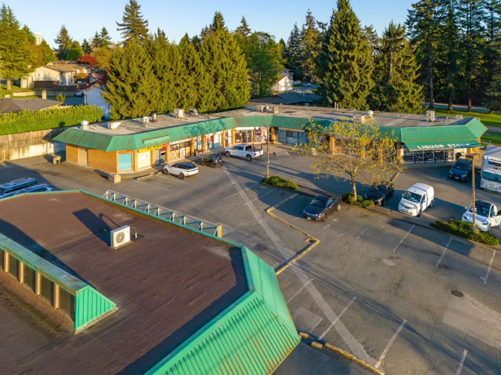 Nordel Place retail plaza aerial view showing parking lot and storefronts on 112 Street, North Delta