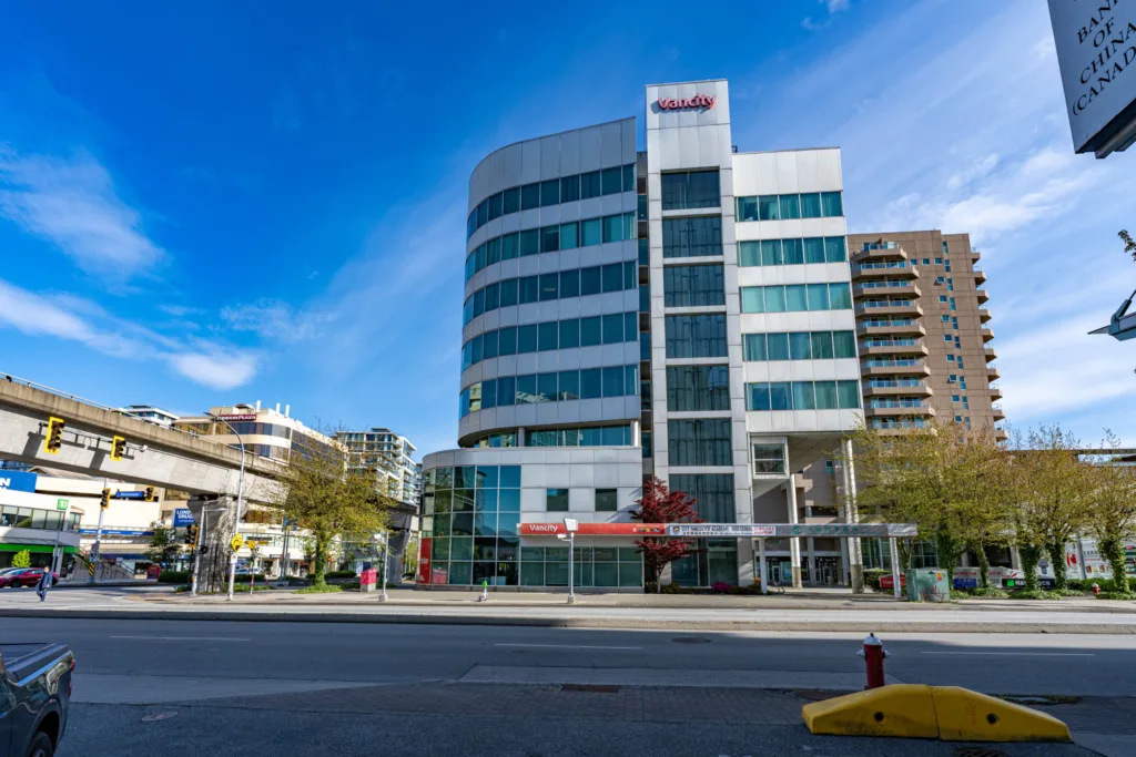 Vancity Tower front facade with Vancity Credit Union signage on No. 3 Road, Richmond