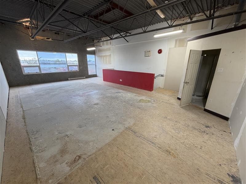 Open warehouse interior with exposed ceiling at 11568 Eburne Way Unit 121, Richmond