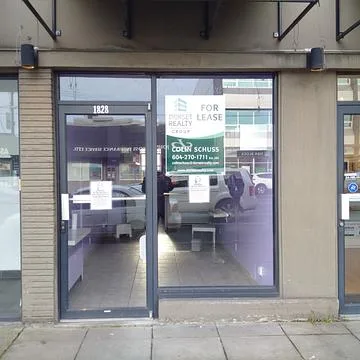 1826-1828 West Broadway entrance with Dorset Realty for lease signage