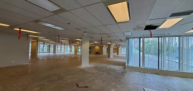 555 West 12th Avenue Unit 302 open office interior with windows