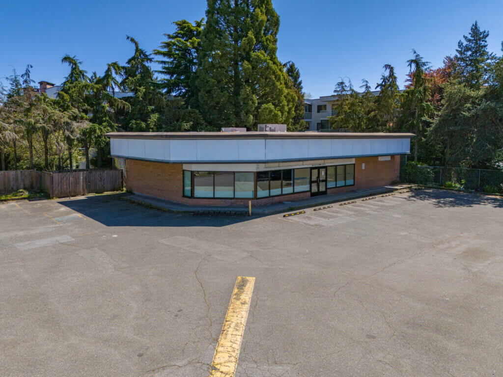 8000 No 3 Road freestanding retail building exterior and parking lot