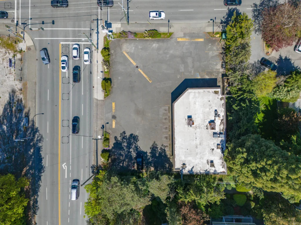 Overhead view of 8000 No 3 Road showing rooftop parking lot and No 3 Road frontage