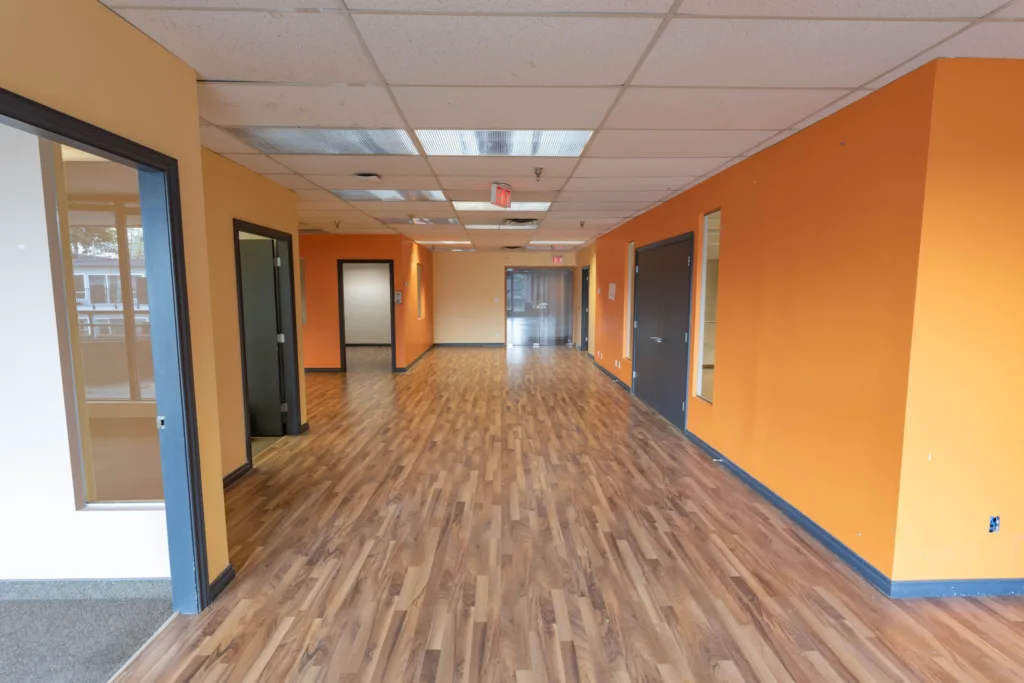 1212 West Broadway Unit 200 wide hallway with office doors