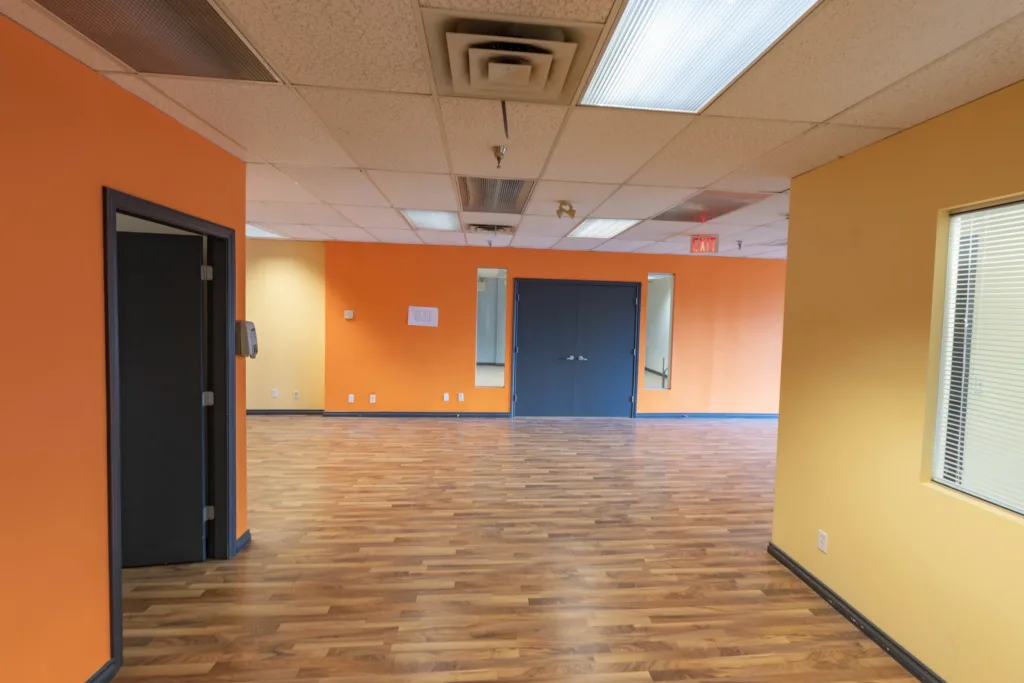 1212 West Broadway Unit 200 open floor area with window