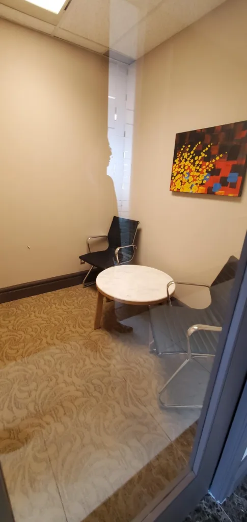 City Square Unit 475 small meeting nook with round table and chairs