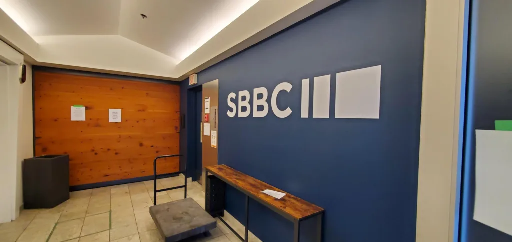 City Square Unit 550 reception area with branded feature wall