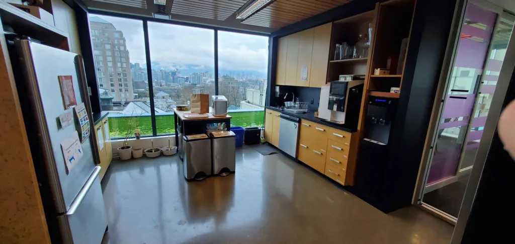 City Square Unit 550 kitchenette with mountain and city views