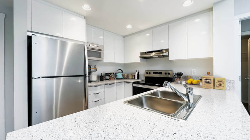 Lelem Village Acadia Rd kitchen with stone countertops