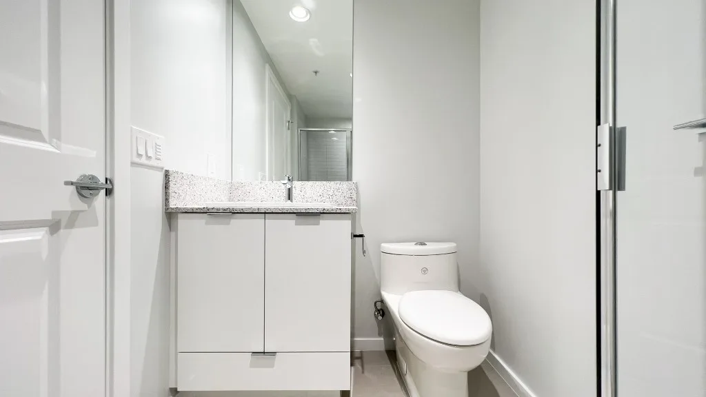 Lelem Village Shortcut Rd bathroom with stone countertop vanity