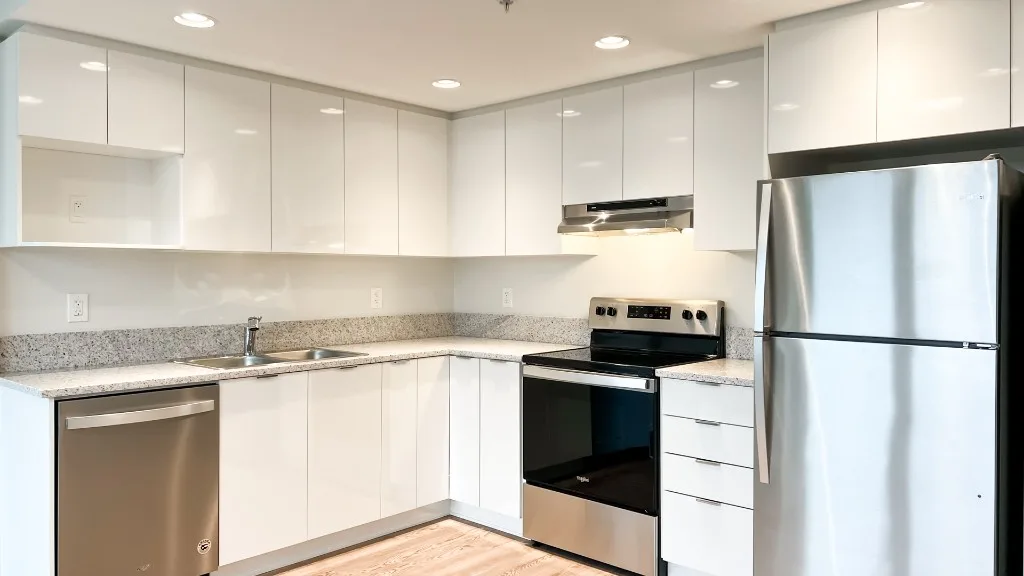 Lelem Village University Blvd kitchen with stainless steel appliances