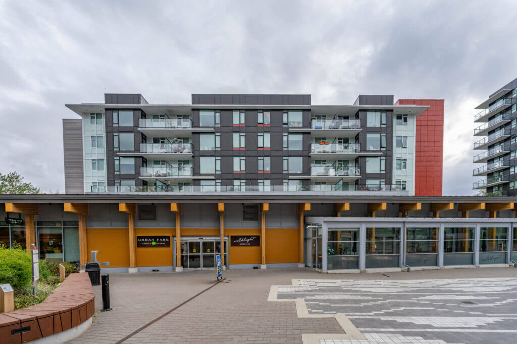 Lelem Village University Blvd Building front facade with ground-floor retail