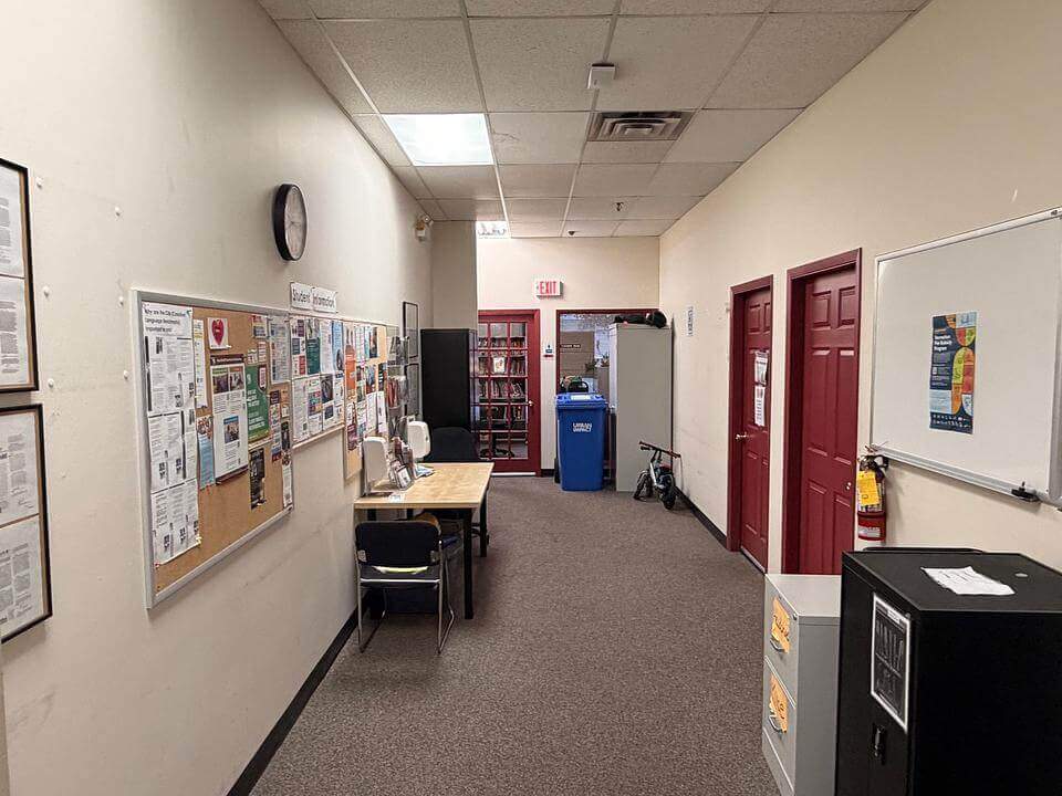 Interior hallway with offices at 8400 Alexandra Road Unit 150, Olympia Centre