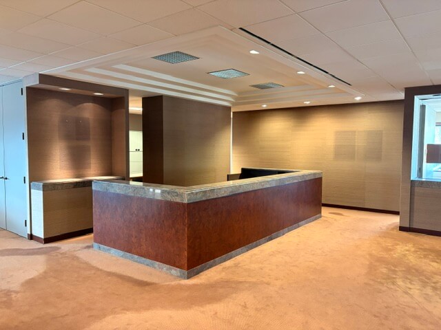 Reception desk area inside Unit 220 at 4800 No 3 Road, Richmond