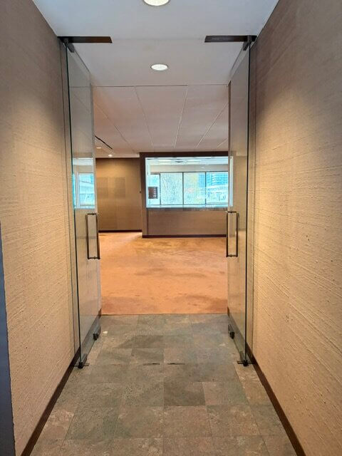 Glass entrance to office Unit 220 at 4800 No 3 Road, Richmond