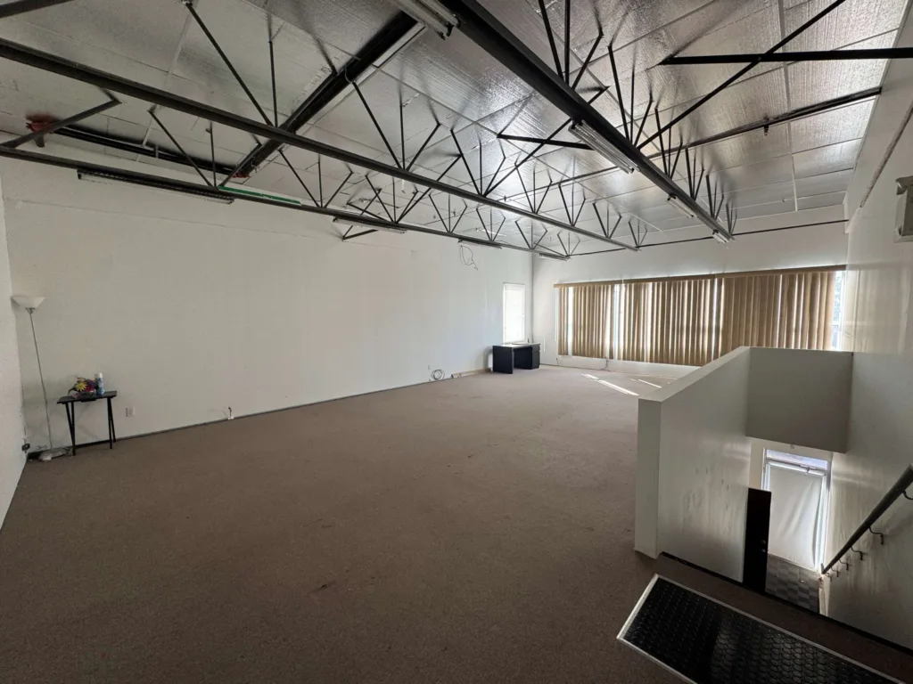 11568 Eburne Way Unit 125 upper level open area with staircase access