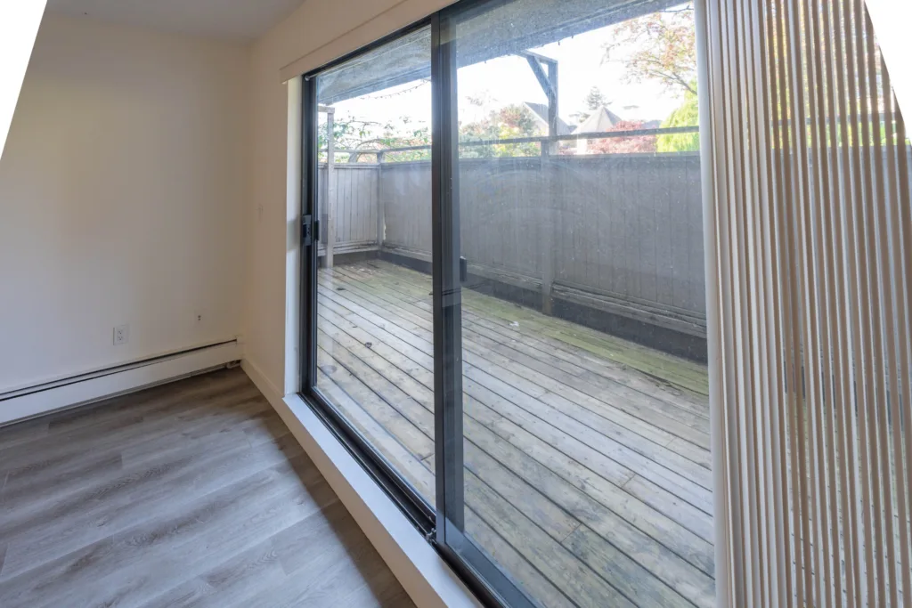 Sliding glass door to private patio at Charles Manor Charles St Unit 201