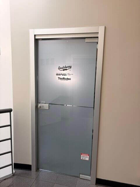 Frosted glass entrance door to Unit 212 at 1737 West 3rd Avenue