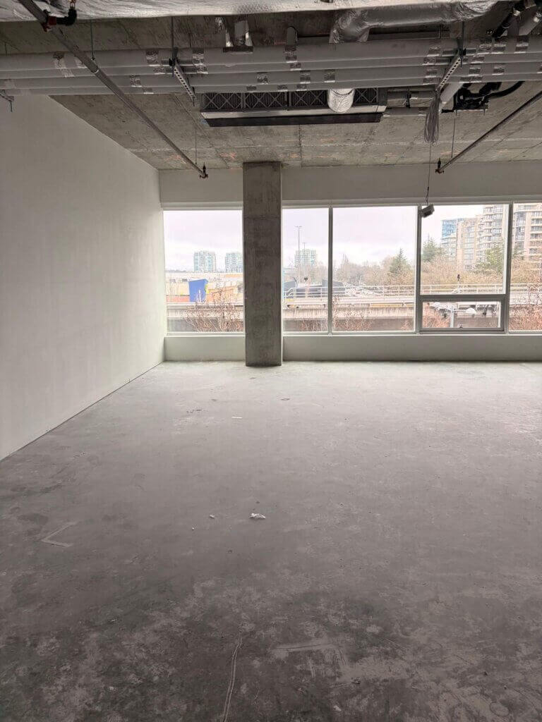 5599 No. 3 Road Unit 425 office space with floor-to-ceiling windows and east-facing city view