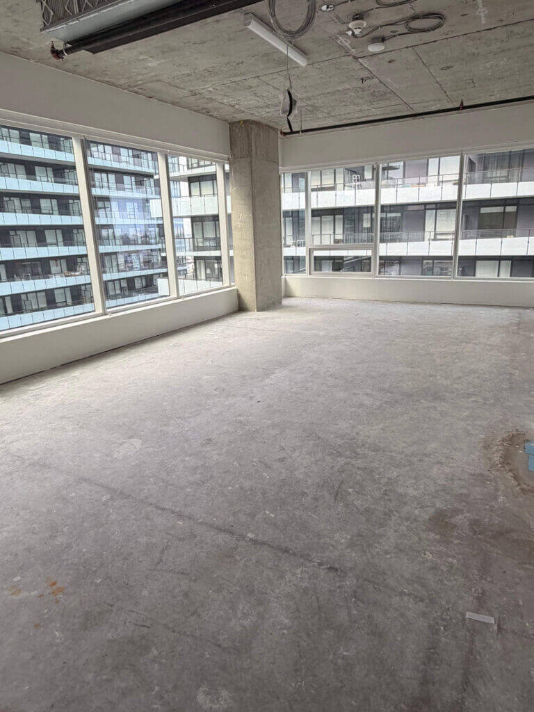 Corner office space with floor-to-ceiling windows at 5599 No. 3 Road Unit 705