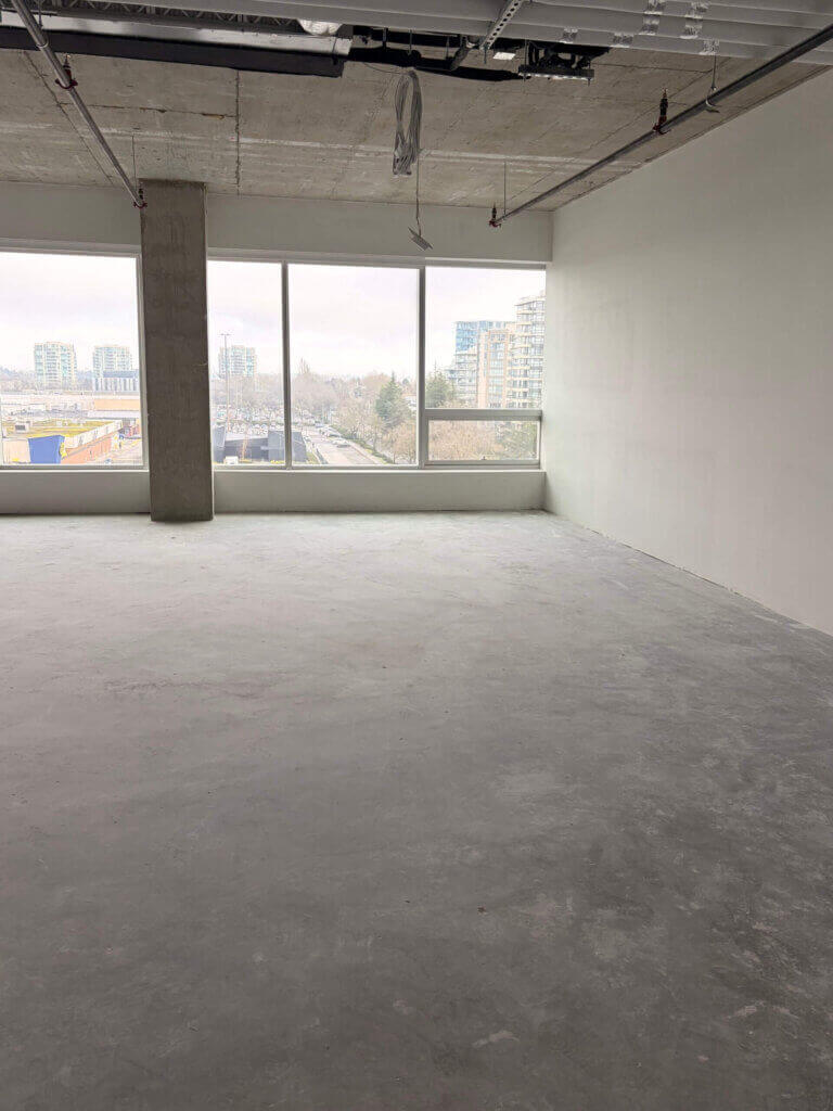 Open office space with east-facing windows at 5599 No. 3 Road Unit 725, Richmond