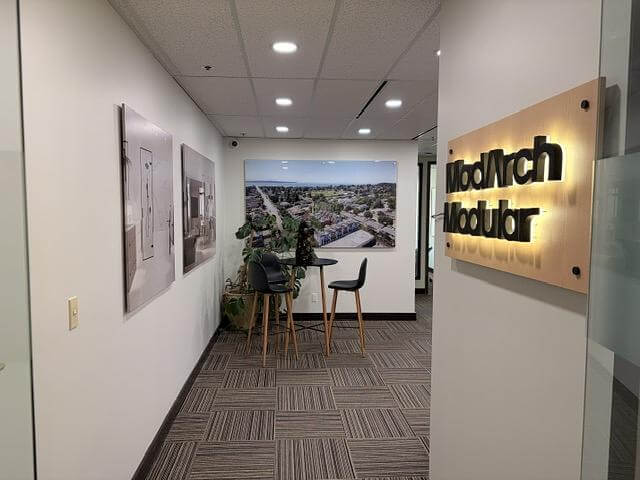 Reception area hallway with seating in office Unit 433 at 5811 Cooney Road, Richmond